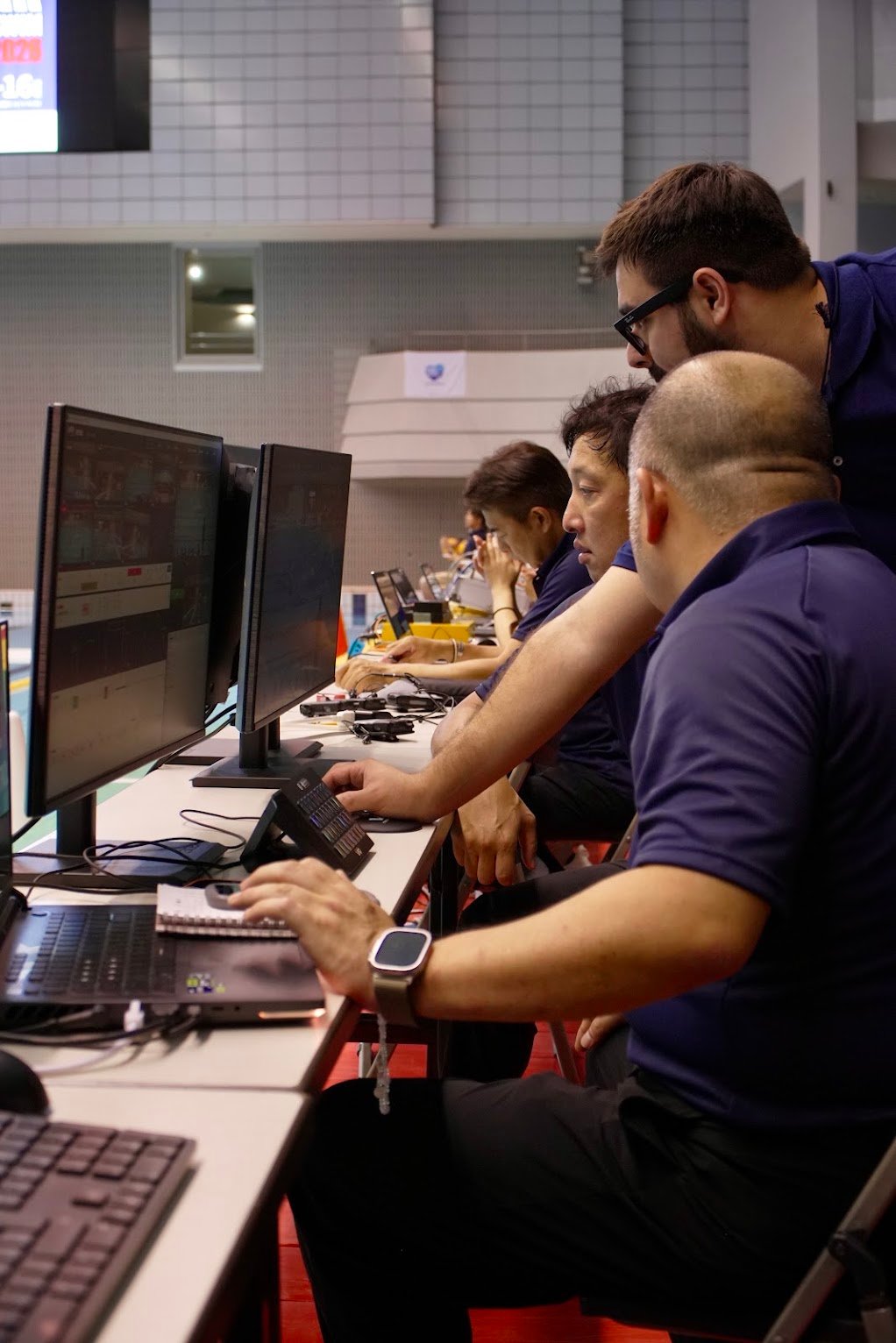 Var Technology operators at the water polo VAR review station
